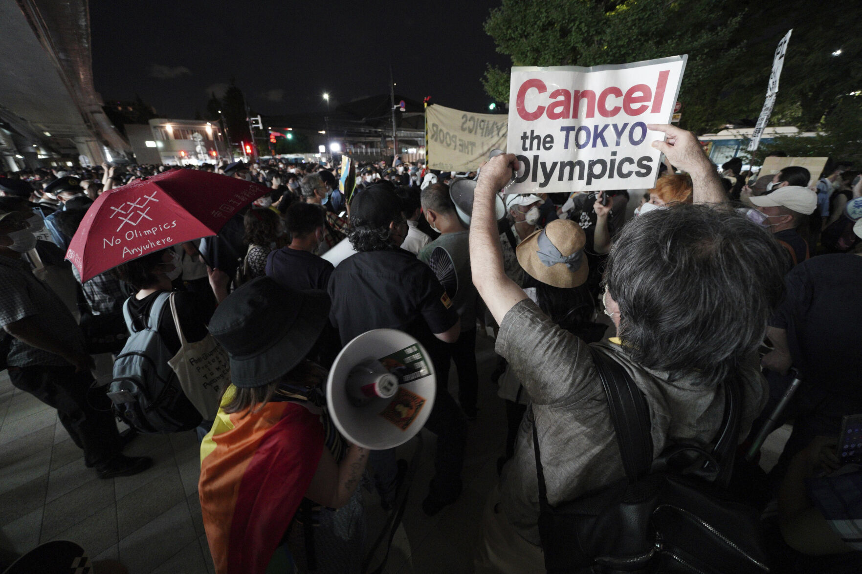 APTOPIX Tokyo Olympics Opening Ceremony Protest